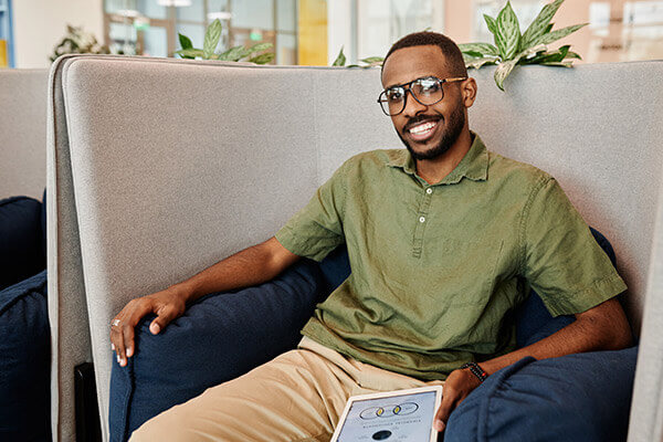 A young man sitting in Horizon Dental's waiting room